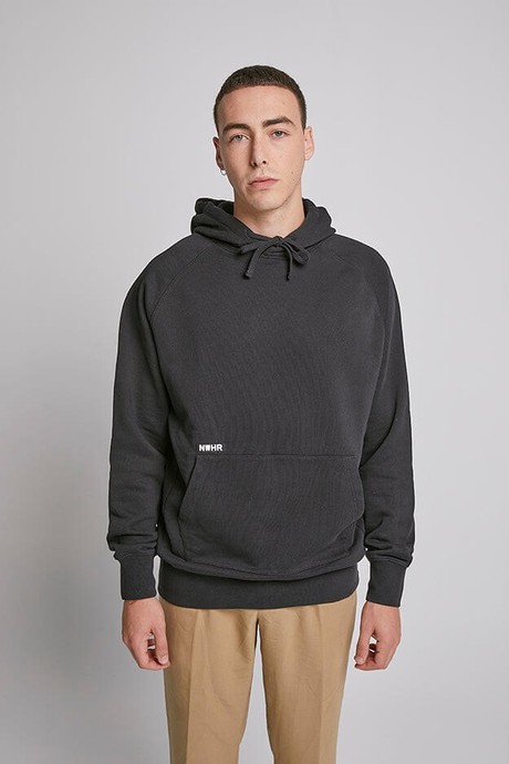 Consumer wearing an ethical streetwear hoodie