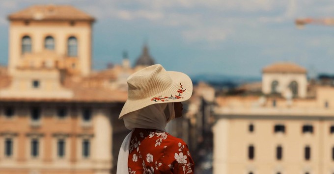 Person looking at Italian buildings